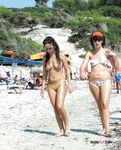 Skinny babes with big asses and perky tits walk around showing off their smooth pussies