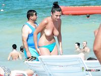 Lavish nudist cutie goes to the beach completely naked