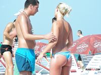 Lavish nudist cutie goes to the beach completely naked