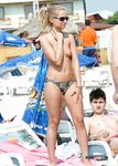 She shows off her perfect, slim body and a pair of beautiful, natural breasts 3