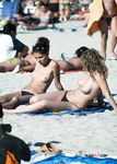 She shows off her perfect, slim body and a pair of beautiful, natural breasts 3