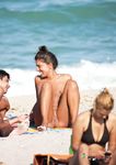 Woman with tiny tits literally just sits at a naked beach 2
