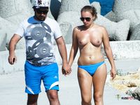 Stunning naturist blonde secretly filmed by a voyeur sitting and sunbathing topless 2