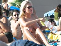 Her tan is still pretty white, but she looks hot anyway 2