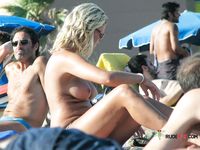Her tan is still pretty white, but she looks hot anyway 2
