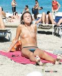 Her tan is still pretty white, but she looks hot anyway 2