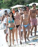Skinny nubiles with firm breasts love chatting and tanning after swimming in the sea 4
