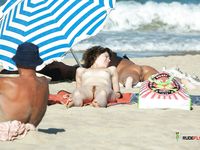 Adult naturist chicks have fun at the beach