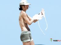 Voyeur catches a dashing mature hottie completely naked on the beach 2