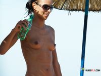 Voyeur films a nudist family with a hidden camera as they have fun at the beach 2