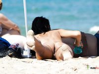 Gorgeous nudist babes secretly filmed enjoying a summer day at the beach 2