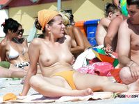 This breathtaking brunette lies down and sunbathes with her perfect, firm, natural breasts bouncing around freely 4