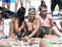 This breathtaking brunette lies down and sunbathes with her perfect, firm, natural breasts bouncing around freely 4