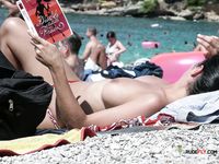 She flaunts her sensual body with perfect curves and beautiful, natural tits before going in the water to swim and have fun 2