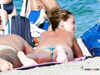 Topless on a Casual Beach Walk