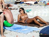 Sunlit Rest on a Beach Towel — Topless With Ocean Views Behind
