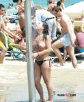 She gets secretly filmed as she applies sunscreen before sunbathing her big, natural tits and a slim body 4