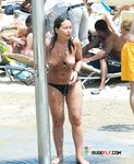 She gets secretly filmed as she applies sunscreen before sunbathing her big, natural tits and a slim body 4