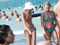 Kinky nudist hotties have all kinds of naughty fun at the beach 2