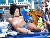 Sexy nudist girl enjoys being naked in the sea and loves to hang out with her other nude friends at the beach 2