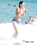 Wading from the Surf Topless in Yellow Bikini Bottoms