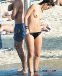 Wading from the Surf Topless in Yellow Bikini Bottoms