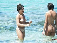 She Enjoys Clear Blue Water at a Quiet Nude Beach