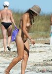 Stunning chicks with slim, killer bodies and perfect, natural tits enjoy their day topless