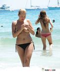 Dashing girls shower after swimming in the sea and sunbathe with their big tits and seductive curves flashing all around 4