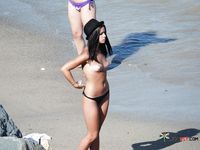 Black Bikini Bottoms Only on a Quiet Topless Beach Stroll