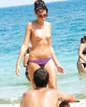 She gets caught on camera by voyeur with her perky tits and trimmed pussy showing 2