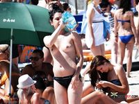 Nudist girl with thin body but fantastic big tits enjoys her time at a naked beach 2