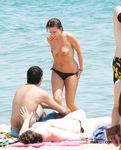She's at a nudist camp, just having fun