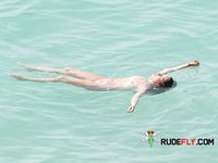 She shows off her perfect ass and her soft, smooth, shaved pussy before being drilled by her boyfriend at the beach 4