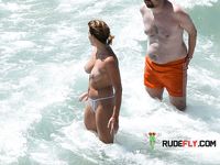 She shows off her perfect ass and her soft, smooth, shaved pussy before being drilled by her boyfriend at the beach 4