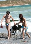 This beautiful nude beach girl shows off her perky tits before lying down with her pussy and ass secretly filmed 3
