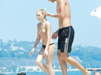 She wears nothing but colorful panties and shows off her magnificent, large breasts 2