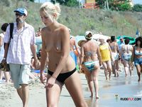 She gets caught on camera sitting naked and showing off her beautiful breasts 4