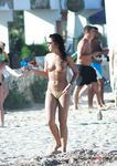 Dashing brunette gets caught on a hidden cam with her big, natural tits on display 4