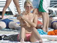 Nudist family caught on a hidden camera enjoying a hot summer day at the beach 2