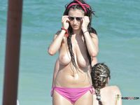 Nudist family caught on a hidden camera enjoying a hot summer day at the beach 2