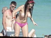 Nudist family caught on a hidden camera enjoying a hot summer day at the beach 2