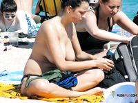Woman in Bikini Bottoms on Beach