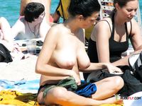 Woman in Bikini Bottoms on Beach