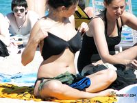 Woman in Bikini Bottoms on Beach
