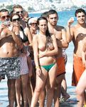 Paddle Fun on a Busy Topless Summer Beach