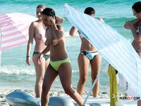 Pierced MILF is not afraid to display her curvy body that includes round tits and fat ass as she enters the water before being joined by her lover 2
