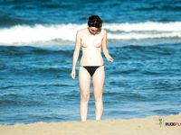 Nudist MILF blonde is getting intimate with her husband by the sea as he gently touches her tight ass while they are having a laugh 2