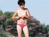 Chilling on a naked beach sounds perfect for this girl, but it also seems great for the people around her, since she has an impressive body 2