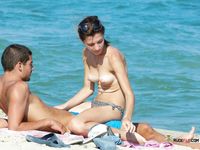 Younger and older babes with seductive curves and natural tits walk around the beach and have fun in the water 2